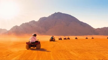 best time for desert safari Hurghada - sunset over the dunes