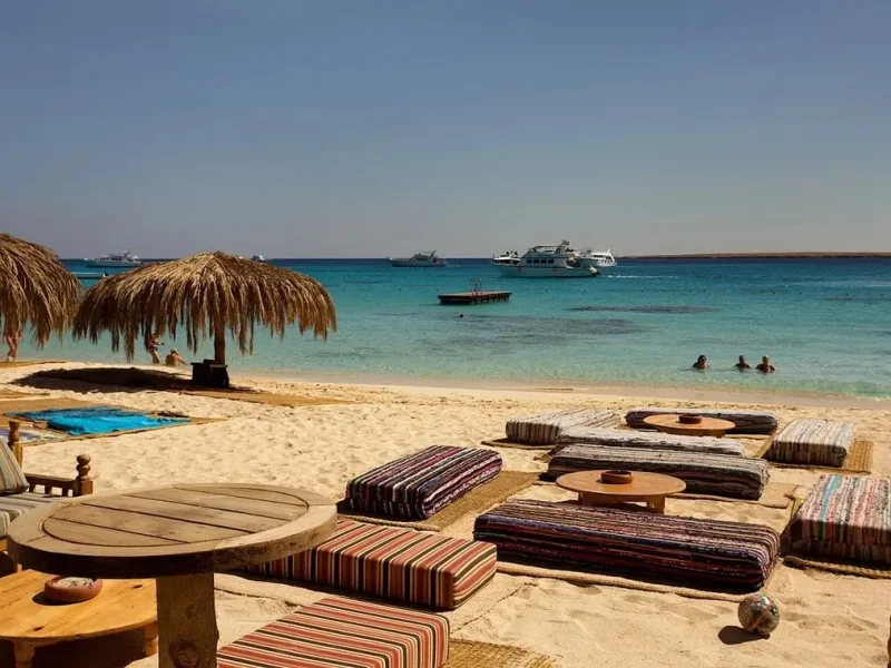 what is included in Mahmya Island tour - scenic boat approaching the island