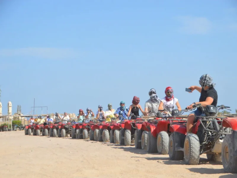 Hurghada ATV tour - group riding ATVs in the desert