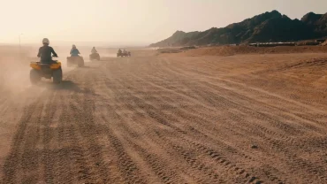 desert go kart Hurghada - two go-karts racing on a sandy track in the desert