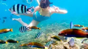 Hurghada activities for toddlers - child playing on beach